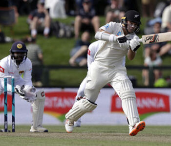 New Zealand's Tom Latham bats during play on day two of the second cricket test between New Zealand and Sri Lanka at Hagley Oval in Christchurch, New Zealand, Thursday, Dec. 27, 2018. (AP Photo/Mark Baker)